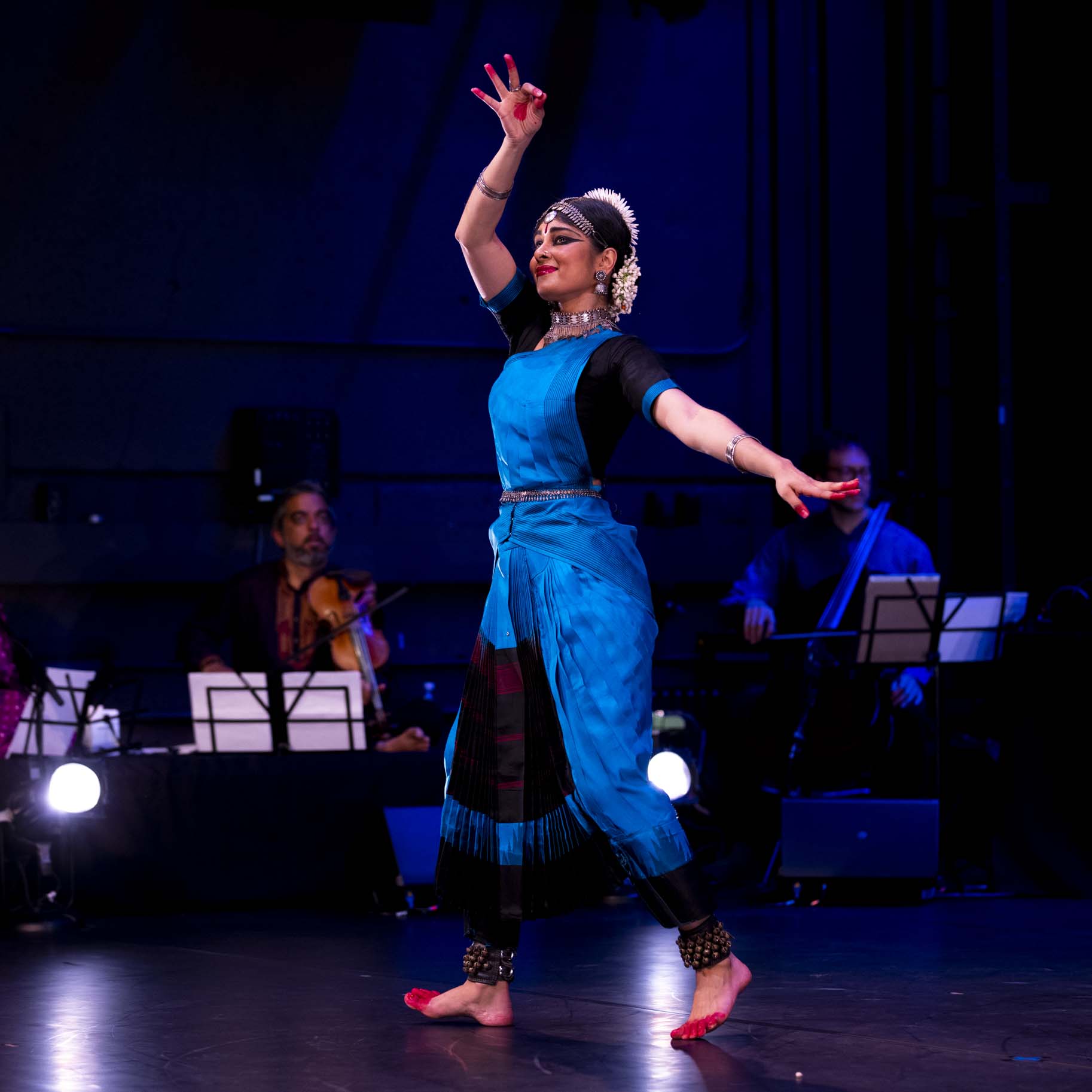 Ashwini Ramaswamy dances onstage.